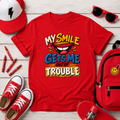Kids T-Shirt "My Smile Gets Me Out of Trouble" Funny Graphic Tee