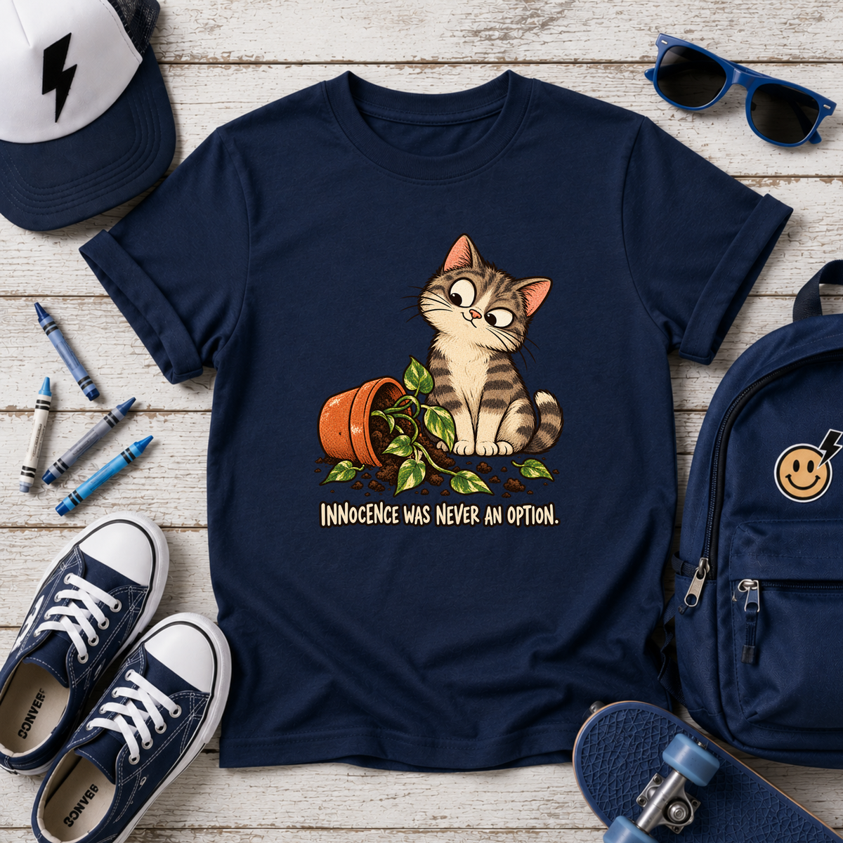 Cute Mischievous Kitten with Knocked-Over Plant (Children’s Cat Shirt)