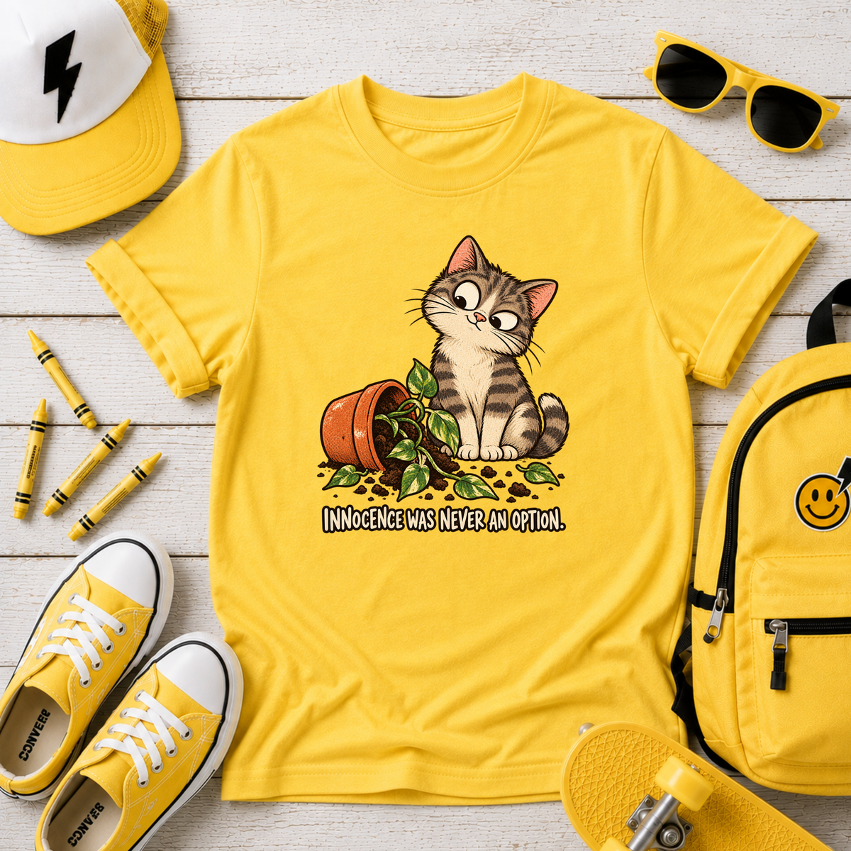 Cute Mischievous Kitten with Knocked-Over Plant (Children’s Cat Shirt)
