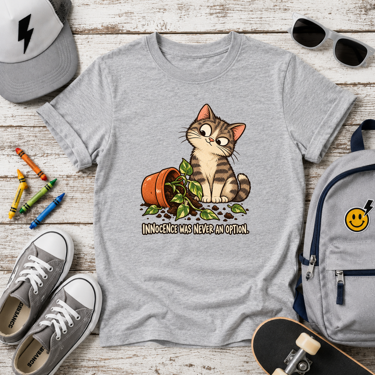 Cute Mischievous Kitten with Knocked-Over Plant (Children’s Cat Shirt)